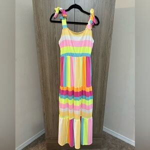 Brand new without tags. Never worn. Adjustable tie straps.